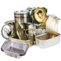 Stack of recyclable metals including tin and aluminum cans.